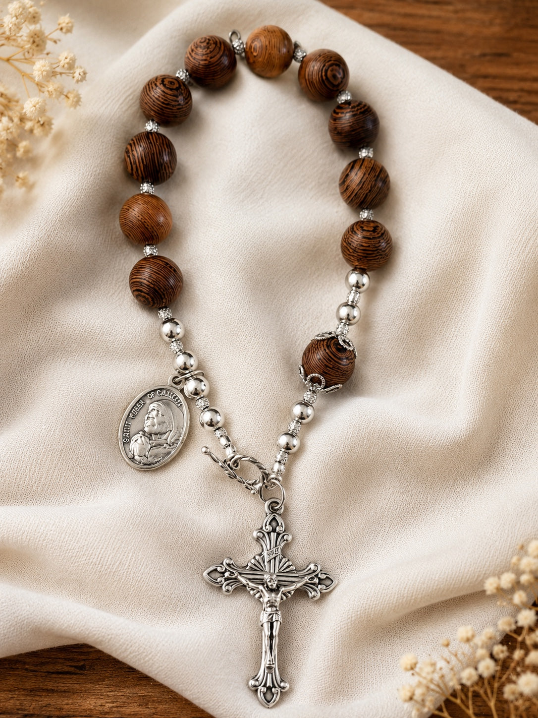 Amelia brown bead pocket rosary bracelet with silver-tone crucifix and saint medal
