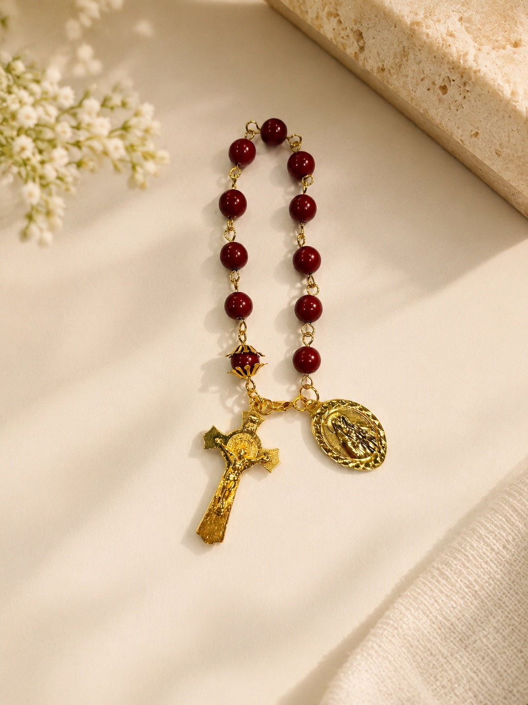 Caroline red bead pocket rosary bracelet with gold-tone crucifix and Marian medal