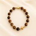 Sofia wood-style beaded bracelet with gold cross accents